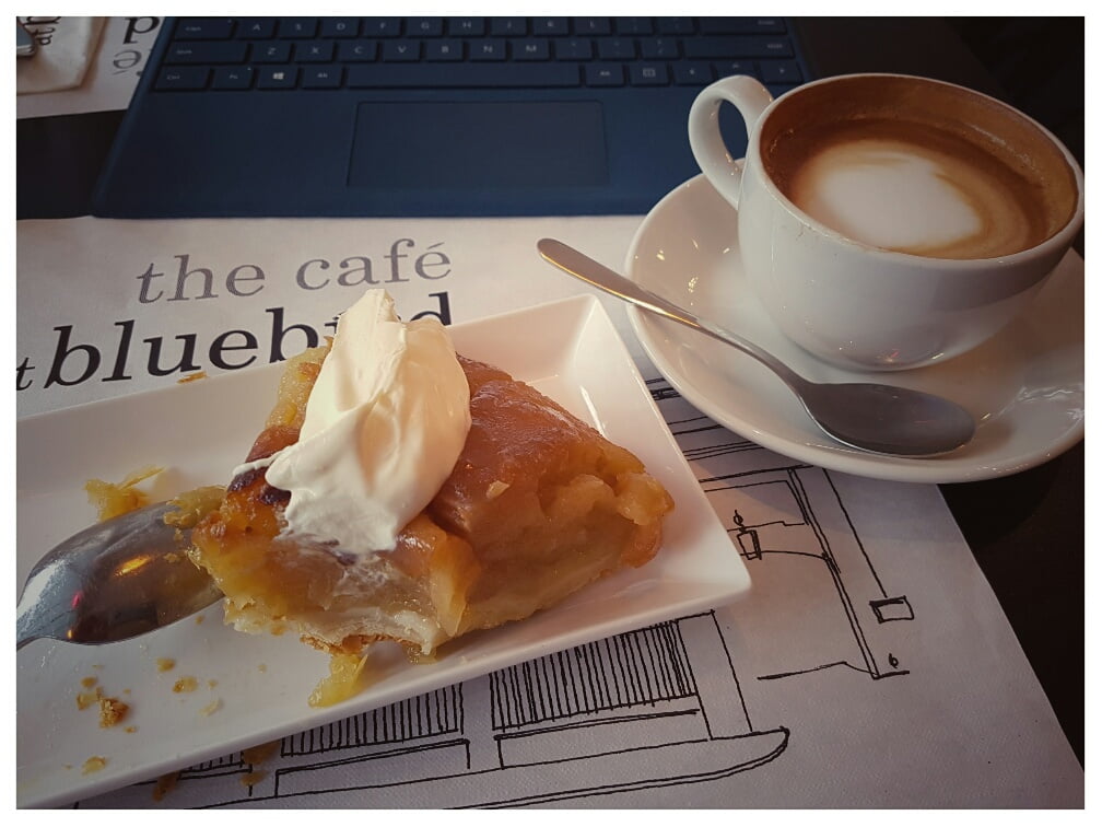 Tarte tatin with creme fraiche and a flat white